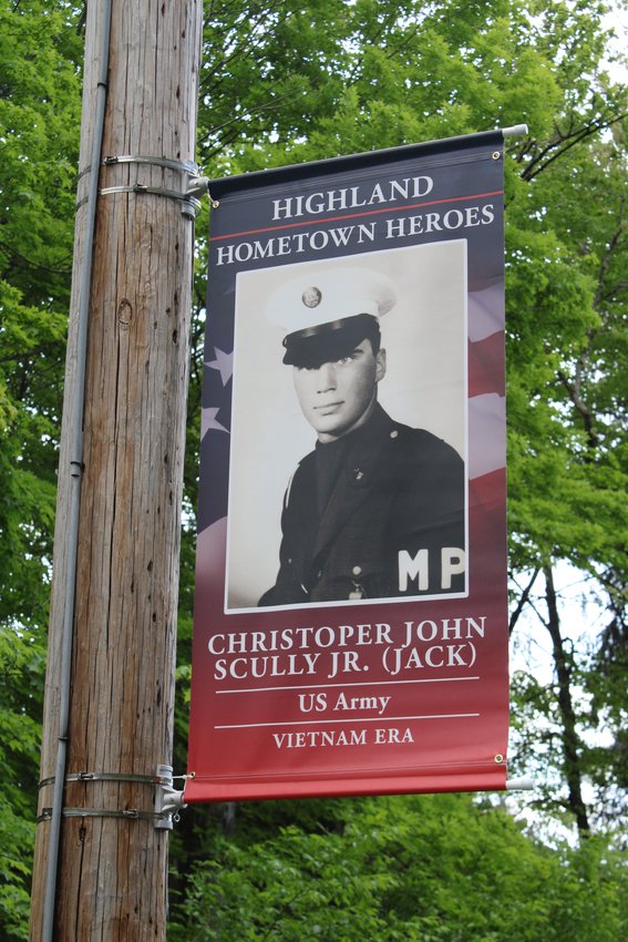 A banner honoring Vietnam veteran Christopher John Scully Jr.
